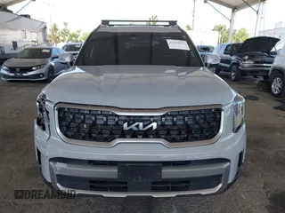 2023 Kia Telluride EX X-Line z VIN 5XYP3DGC0PG395945, wystawiony jako IAAI lot #42544923 z przebiegiem 19 046 mil mil oraz . Historia ofert i sprzedaży dostępna na DreamBid. Obrazek 12.