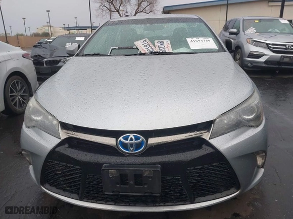 2016 Toyota Camry Hybrid LE with VIN 4T1BD1FKXGU196930, listed as a IAAI auction lot 41694789 with 89,149 mi miles. Bid and sale history available at carsss.com. Image 13.