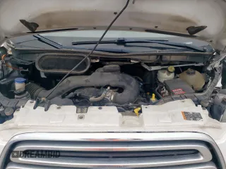 2016 Ford Transit Cargo with VIN 1FTYR1ZM7GKA69898, listed as a Copart auction lot 63637575 with 213,230 mi miles and Salvage title. Bid and sale history available at DreamBid. Image 12.