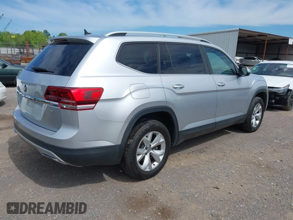 2018 Volkswagen Atlas SE with VIN 1V2DR2CAXJC521412, listed as a IAAI auction lot 42309661 with 99,045 mi miles and . Bid and sale history available at DreamBid. Image 4.