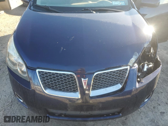 2009 Pontiac Vibe with VIN 5Y2SM67069Z401681, listed as a Copart auction lot 76338944 with 191,368 mi miles and Salvage Title. Bid and sale history available at carsss.com. Image 11.
