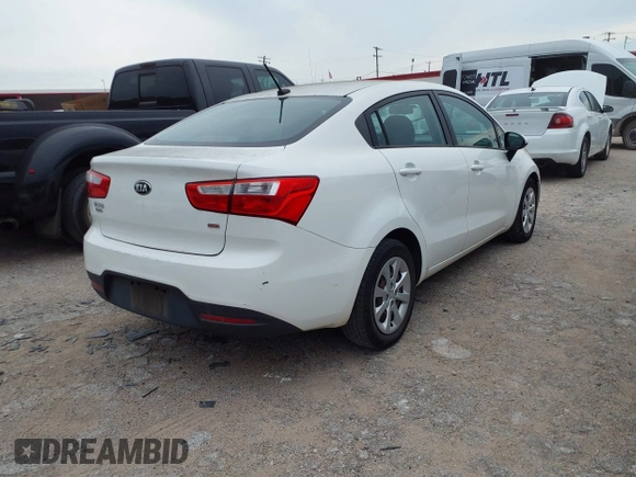 2014 Kia Rio LX with VIN KNADM4A3XE6384733, listed as a IAAI auction lot 42196921 with 153,084 mi miles and . Bid and sale history available at DreamBid. Image 4.