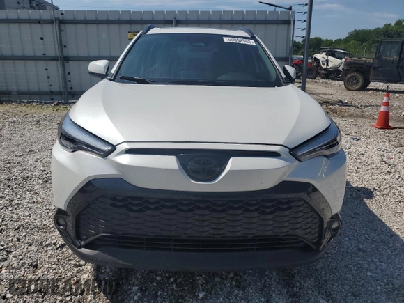 2023 Toyota Corolla Cross Hybrid S with VIN 7MUFBABG5PV008595, listed as a Copart auction lot 60002585 with 9,052 mi miles and Salvage title. Bid and sale history available at DreamBid. Image 5.