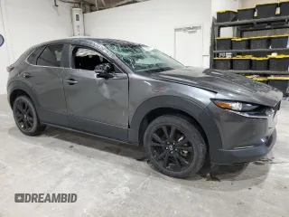 2024 Mazda CX-30 S Select Sport with VIN 3MVDMBBM2RM628913, listed as a Copart auction lot 62383245 with 33,793 mi miles and Non repairable. Bid and sale history available at DreamBid. Image 4.