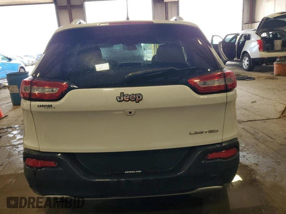 2015 Jeep Cherokee Limited with VIN 1C4PJLDBXFW765909, listed as a Copart auction lot 52293525 with 125,702 mi miles and Salvage Title. Bid and sale history available at DreamBid. Image 6.
