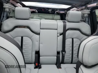 2023 Rivian R1S Adventure z VIN 7PDSGABA6PN017889, wystawiony jako Copart lot #68860864 z przebiegiem 7661 mil mil oraz Szkody całkowita. Historia ofert i sprzedaży dostępna na DreamBid. Obrazek 10.