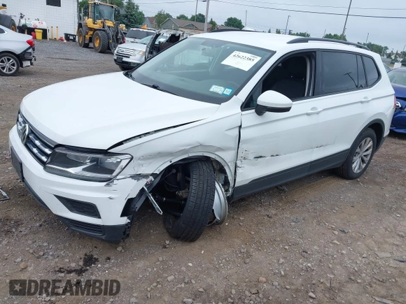 2020 Volkswagen Tiguan S with VIN 3VV0B7AX0LM140910, listed as a IAAI auction lot 42622385 with 80,998 mi miles and . Bid and sale history available at DreamBid. Image 2.
