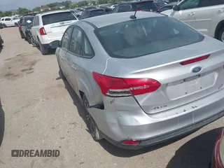 2017 Ford Focus SE with VIN 1FADP3FEXHL285064, listed as a IAAI auction lot 42528911 with 118,659 mi miles and . Bid and sale history available at DreamBid. Image 3.