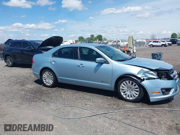 2010 Ford Fusion Hybrid z VIN 3FADP0L33AR385001, wystawiony jako IAAI lot #42074965 z przebiegiem 195 962 mil mil oraz . Historia ofert i sprzedaży dostępna na DreamBid. Obrazek 13.