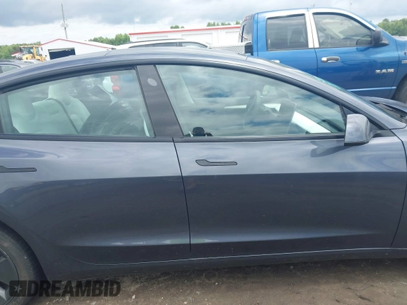 2023 Tesla Model 3 with VIN 5YJ3E1EAXPF628911, listed as a IAAI auction lot 42362410 with 25,387 mi miles and . Bid and sale history available at DreamBid. Image 14.