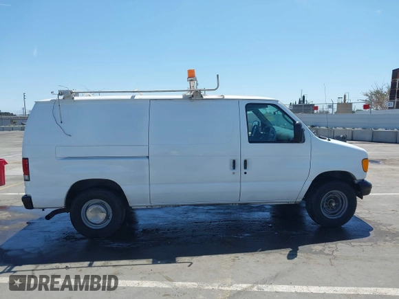 2006 Ford Econoline Cargo with VIN 1FTNE24L66HA64111, listed as a IAAI auction lot 41947445 with 205,025 mi miles and . Bid and sale history available at DreamBid. Image 12.