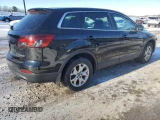 2015 Mazda CX-9 Sport с VIN JM3TB2BA4F0450064, выставлен на аукционе Copart как лот 86707144 с пробегом 163 743 миль миль и Списание • Salvage title. История ставок и продаж доступна на DreamBid. Изображение 3.