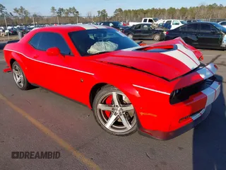 2021 Dodge Challenger R/T Scat Pack z VIN 2C3CDZFJ9MH637240, wystawiony jako IAAI lot #41411595 z przebiegiem 13 175 mil mil oraz . Historia ofert i sprzedaży dostępna na DreamBid. Obrazek 1.
