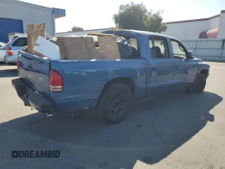 2003 Dodge Dakota Sport with VIN 1D7HL38X33S144315, listed as a Copart auction lot 65842394 with 0 mi miles and Salvage Title. Bid and sale history available at carsss.com. Image 3.