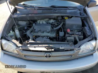 1999 Toyota Sienna LE with VIN 4T3ZF13C5XU144781, listed as a Copart auction lot 48932535 with 216,436 mi miles and Salvage Title. Bid and sale history available at carsss.com. Image 11.