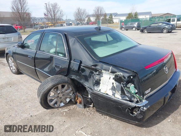 2011 Cadillac DTS Luxury Collection z VIN 1G6KD5E68BU125706, wystawiony jako IAAI lot #41832715 z przebiegiem 103 017 mil mil oraz . Historia ofert i sprzedaży dostępna na DreamBid. Obrazek 3.