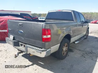2005 Ford F-150 XLT with VIN 1FTPX12575NA22872, listed as a IAAI auction lot 41532157 with 261,093 mi miles. Bid and sale history available at carsss.com. Image 4.