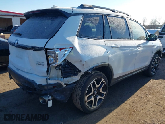 2023 Honda Passport Elite with VIN 5FNYF8H05PB005081, listed as a IAAI auction lot 41698186 with 31,853 mi miles and . Bid and sale history available at DreamBid. Image 4.
