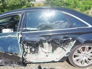 2015 Audi A8 4.0T with VIN WAU32AFD3FN039603, listed as a IAAI auction lot 42267467 with 120,393 mi miles and . Bid and sale history available at DreamBid. Image 18.