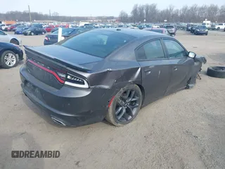 2019 Dodge Charger SXT with VIN 2C3CDXBG8KH668202, listed as a IAAI auction lot 41710007 with 72,640 mi miles. Bid and sale history available at carsss.com. Image 4.