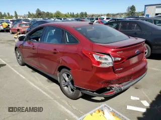 2014 Ford Focus SE with VIN 1FADP3F24EL391690, listed as a Copart auction lot 57019544 with 83,889 mi miles and Salvage Title. Bid and sale history available at carsss.com. Image 2.