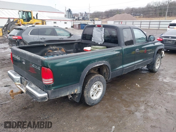 2000 Dodge Dakota Sport with VIN 1B7GG22N3YS539484, listed as a IAAI auction lot 41748568 with 290,117 mi miles. Bid and sale history available at carsss.com. Image 4.