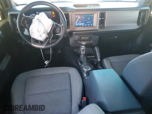 2023 Ford Bronco with VIN 1FMDE5BHXPLA82939, listed as a Copart auction lot 81402454 with 23,392 mi miles and Salvage Title. Bid and sale history available at DreamBid. Image 8.