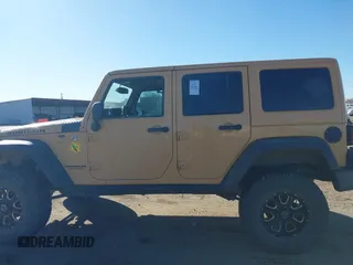 2013 Jeep Wrangler Unlimited Rubicon with VIN 1C4BJWFG3DL632668, listed as a IAAI auction lot 41751546 with 153,149 mi miles. Bid and sale history available at carsss.com. Image 13.