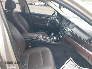 2014 BMW 5 Series 528i xDrive with VIN WBA5A7C56ED613949, listed as a IAAI auction lot 40353558 with 94,672 mi miles and . Bid and sale history available at DreamBid. Image 5.