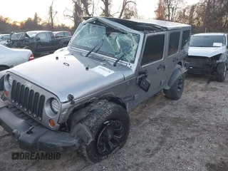 2018 Jeep Wrangler JK Unlimited Sport S with VIN 1C4BJWDG5JL862100, listed as a IAAI auction lot 40986228 with 1 mi miles. Bid and sale history available at carsss.com. Image 6.