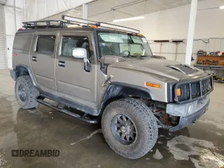 2006 Hummer H2 z VIN 5GRGN23U96H115103, wystawiony jako Copart lot #59346915 z przebiegiem 184 241 mil mil oraz Tytuł czysty. Historia ofert i sprzedaży dostępna na DreamBid. Obrazek 4.
