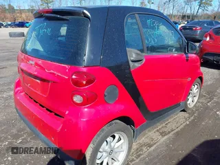 2009 Smart fortwo Pure with VIN WMEEJ31X29K305678, listed as a IAAI auction lot 41691476 with Not Provided miles and . Bid and sale history available at DreamBid. Image 4.