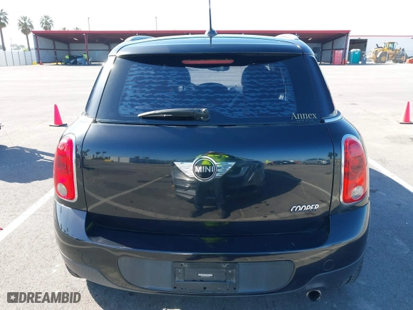 2013 MINI Cooper Countryman with VIN WMWZB3C52DWM07621, listed as a IAAI auction lot 42085389 with 153,714 mi miles. Bid and sale history available at carsss.com. Image 16.