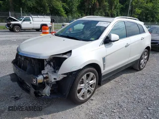 2010 Cadillac SRX Premium Collection with VIN 3GYFNFEY2AS528611, listed as a IAAI auction lot 42770194 with 213,366 mi miles and . Bid and sale history available at DreamBid. Image 2.