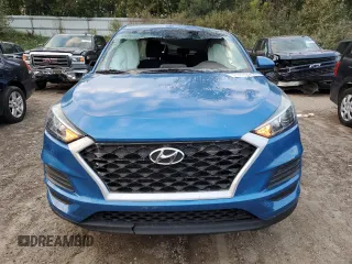 2019 Hyundai Tucson SE with VIN KM8J23A48KU845459, listed as a Copart auction lot 71819214 with 99,550 mi miles and Salvage Title. Bid and sale history available at carsss.com. Image 5.