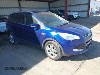 2016 Ford Escape Titanium with VIN 1FMCU9JXXGUB58961, listed as a IAAI auction lot 41772977 with 122,665 mi miles. Bid and sale history available at carsss.com. Image 1.