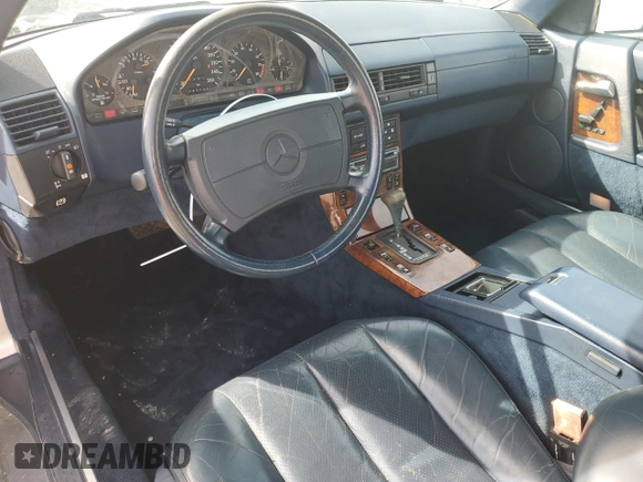 1991 Mercedes-Benz 300 with VIN WDBFA61E1MF022918, listed as a Copart auction lot 46788785 with 262,144 mi miles and Salvage Title. Bid and sale history available at DreamBid. Image 8.