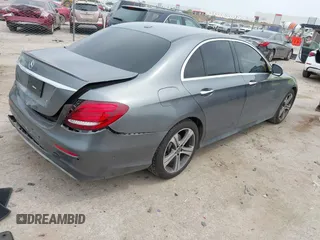 2018 Mercedes-Benz E 300 with VIN WDDZF4JB7JA357139, listed as a IAAI auction lot 42065511 with 54,812 mi miles and . Bid and sale history available at DreamBid. Image 4.