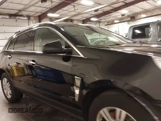 2011 Cadillac SRX Luxury Collection with VIN 3GYFNDEY3BS675672, listed as a IAAI auction lot 41804978 with 148,136 mi miles. Bid and sale history available at carsss.com. Image 13.