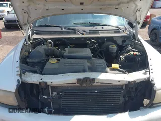 2000 Dodge Dakota Sport z VIN 1B7GG2AN2YS636449, wystawiony jako IAAI lot #42154548 z przebiegiem 186 126 mil mil oraz . Historia ofert i sprzedaży dostępna na DreamBid. Obrazek 10.