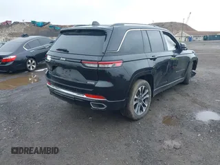 2023 Jeep Grand Cherokee Overland with VIN 1C4RJHDG2PC516797, listed as a IAAI auction lot 42026063 with 25,808 mi miles and . Bid and sale history available at DreamBid. Image 4.