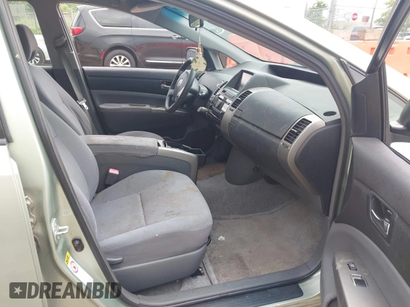 2007 Toyota Prius z VIN JTDKB20U673287354, wystawiony jako IAAI lot #42510185 z przebiegiem 253 448 mil mil oraz . Historia ofert i sprzedaży dostępna na DreamBid. Obrazek 5.