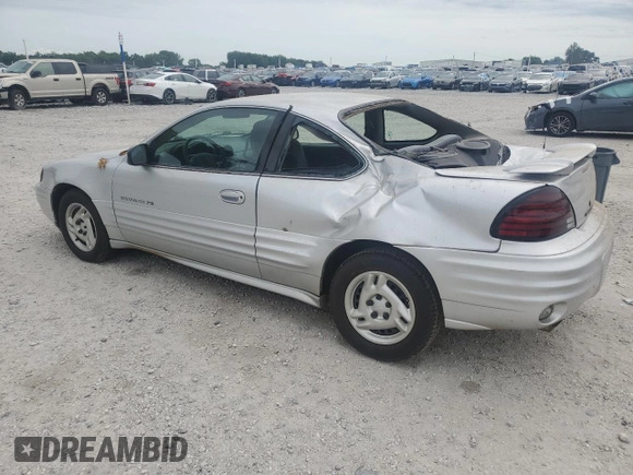 2001 Pontiac Grand Am with VIN 1G2NE12TX1M668035, listed as a Copart auction lot 59700585 with 60,965 mi miles and Salvage title. Bid and sale history available at DreamBid. Image 2.