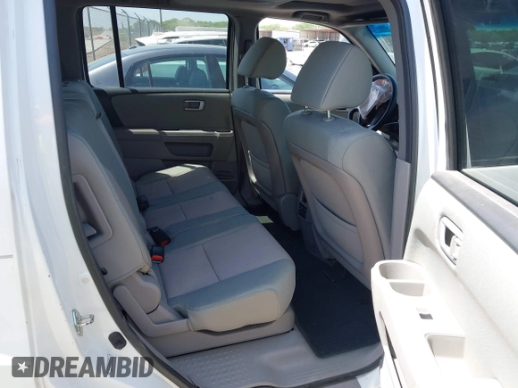 2015 Honda Pilot SE z VIN 5FNYF3H33FB005141, wystawiony jako IAAI lot #41949646 z przebiegiem 180 807 mil mil oraz . Historia ofert i sprzedaży dostępna na DreamBid. Obrazek 8.