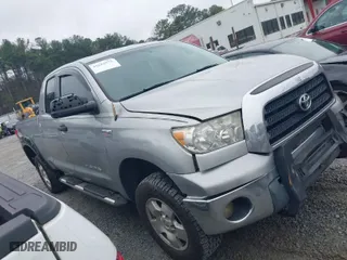 2007 Toyota Tundra SR5 with VIN 5TBRV54177S450608, listed as a IAAI auction lot 41615975 with 242,261 mi miles. Bid and sale history available at carsss.com. Image 13.