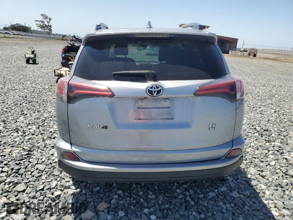 2017 Toyota RAV4 LE with VIN 2T3BFREV1HW566613, listed as a Copart auction lot 59925655 with 74,444 mi miles and Salvage title. Bid and sale history available at DreamBid. Image 6.