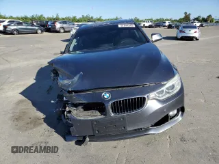 2015 BMW 4 Series 428i with VIN WBA3N7C54FK222324, listed as a Copart auction lot 57644345 with 114,696 mi miles and Salvage title. Bid and sale history available at DreamBid. Image 5.