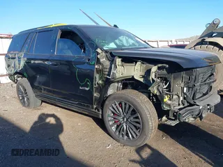 2023 Cadillac Escalade AWD V-Series z VIN 1GYS4HK97PR453426, wystawiony jako IAAI lot #41411066 z przebiegiem 13 764 mil mil oraz . Historia ofert i sprzedaży dostępna na DreamBid. Obrazek 1.