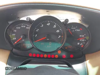 1999 Porsche Boxster with VIN WP0CA2986XU627495, listed as a IAAI auction lot 42112724 with 94,090 mi miles and . Bid and sale history available at DreamBid. Image 7.