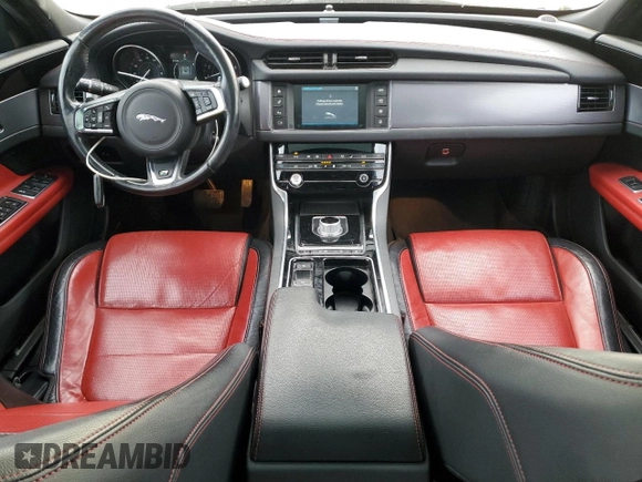 2016 Jaguar XF with VIN SAJBL4BV6GCY16964, listed as a Copart auction lot 82786584 with 100,587 mi miles and Salvage Title. Bid and sale history available at DreamBid. Image 8.